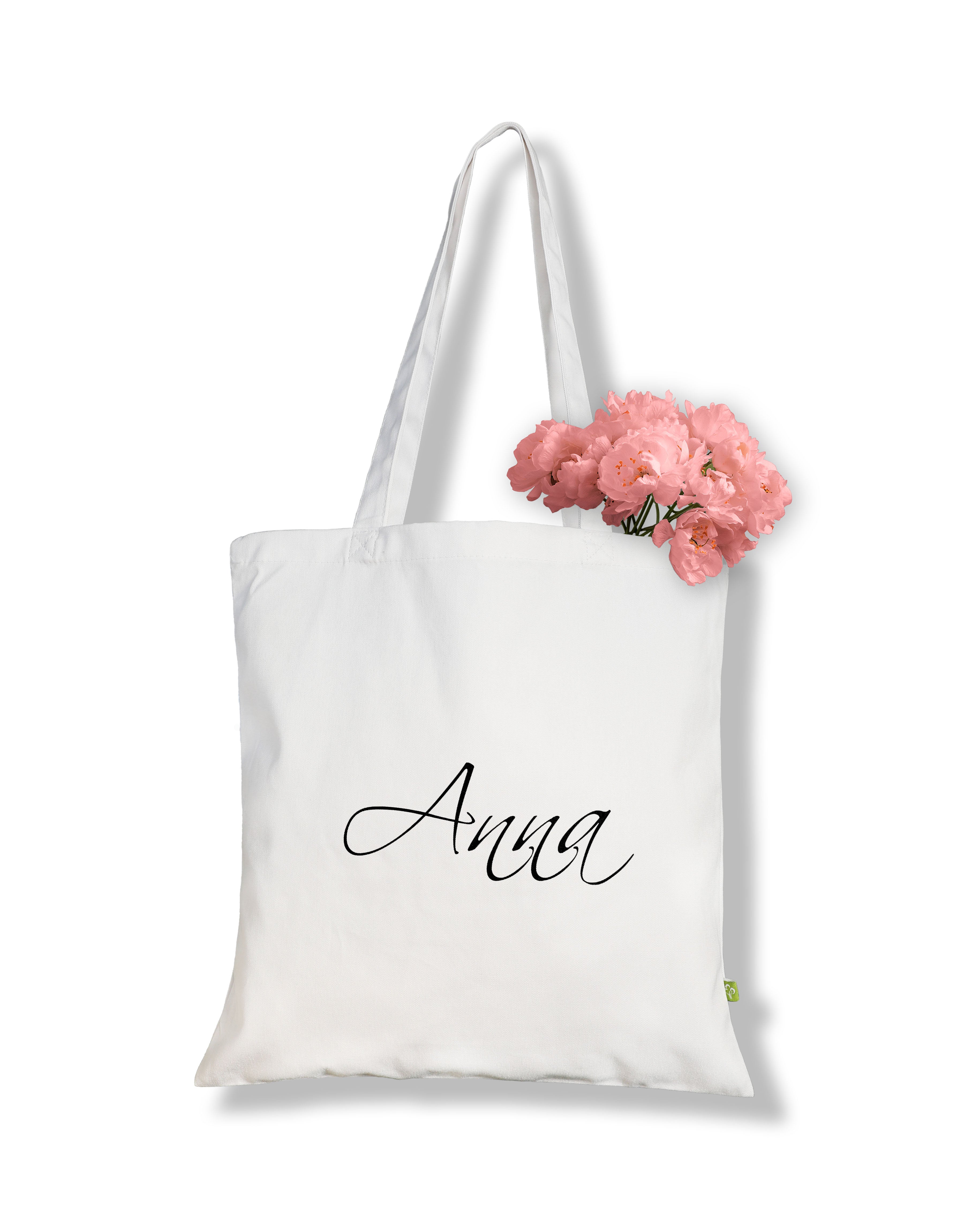 Make it personal with our signature name tote bag in white.