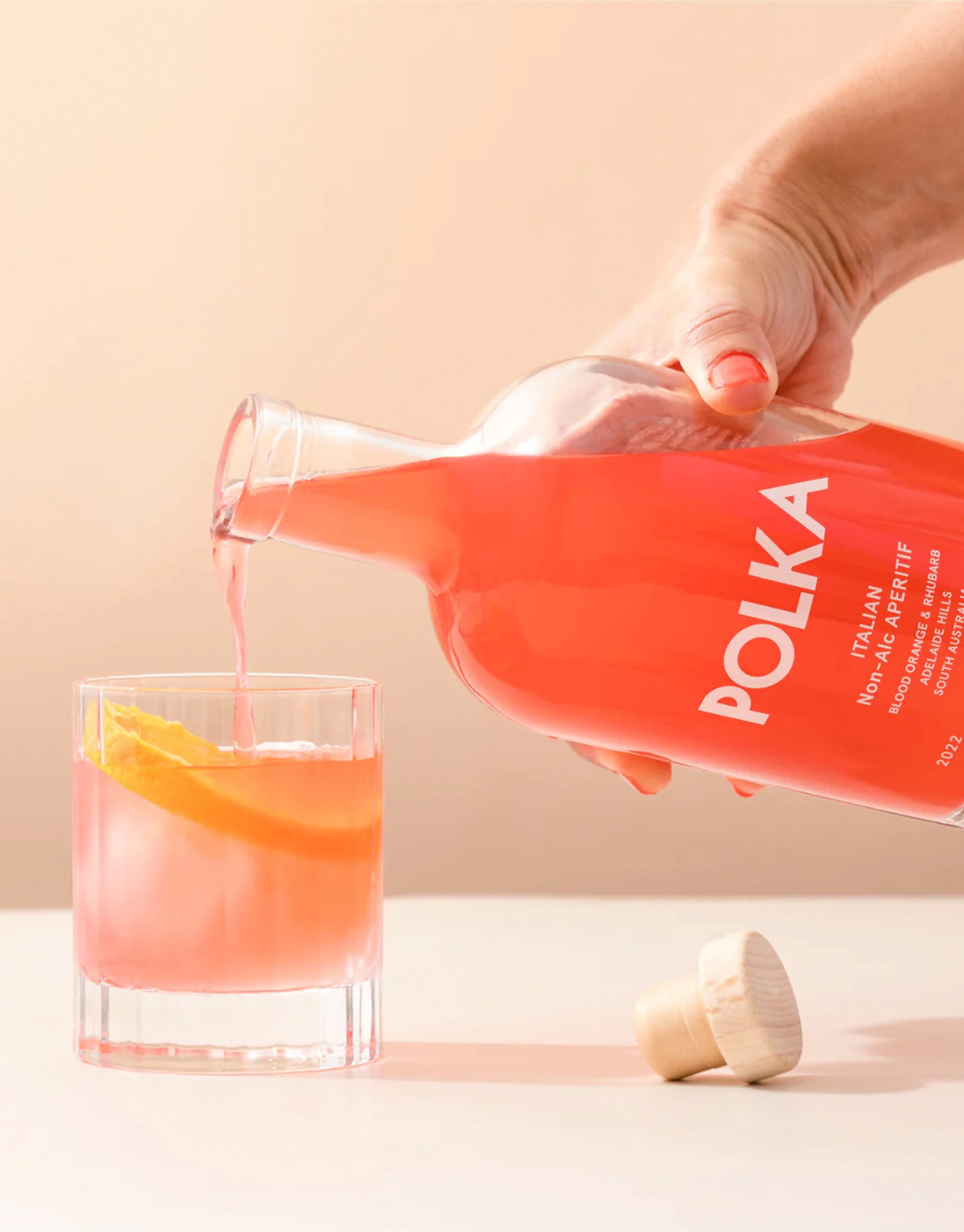 Aperitif being poured into a glass