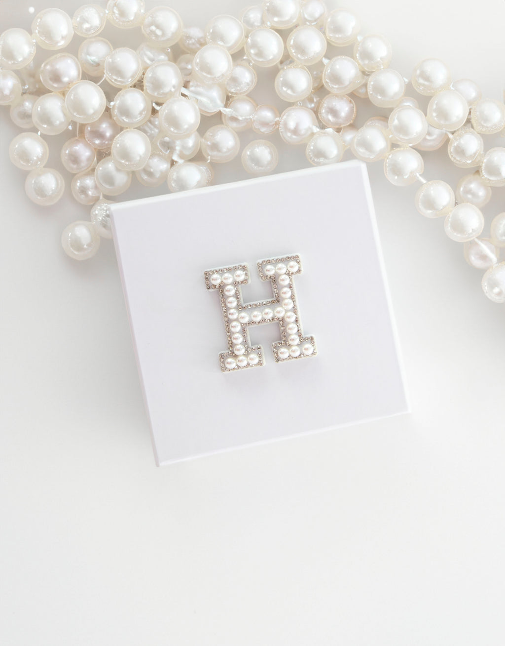 23Dreams Petite White Gift Box: Unveil a world of surprises petite white gift box, one personalised with your initial in a pearl and rhinestone patch.