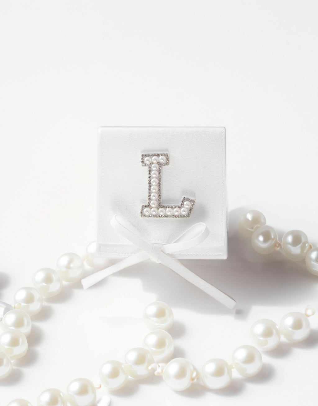 23Dreams Handmade Sueded White Pouch - Personalised with Letter "L" in white pearl and rhinestone patch